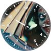 joker looking through ce wall clock